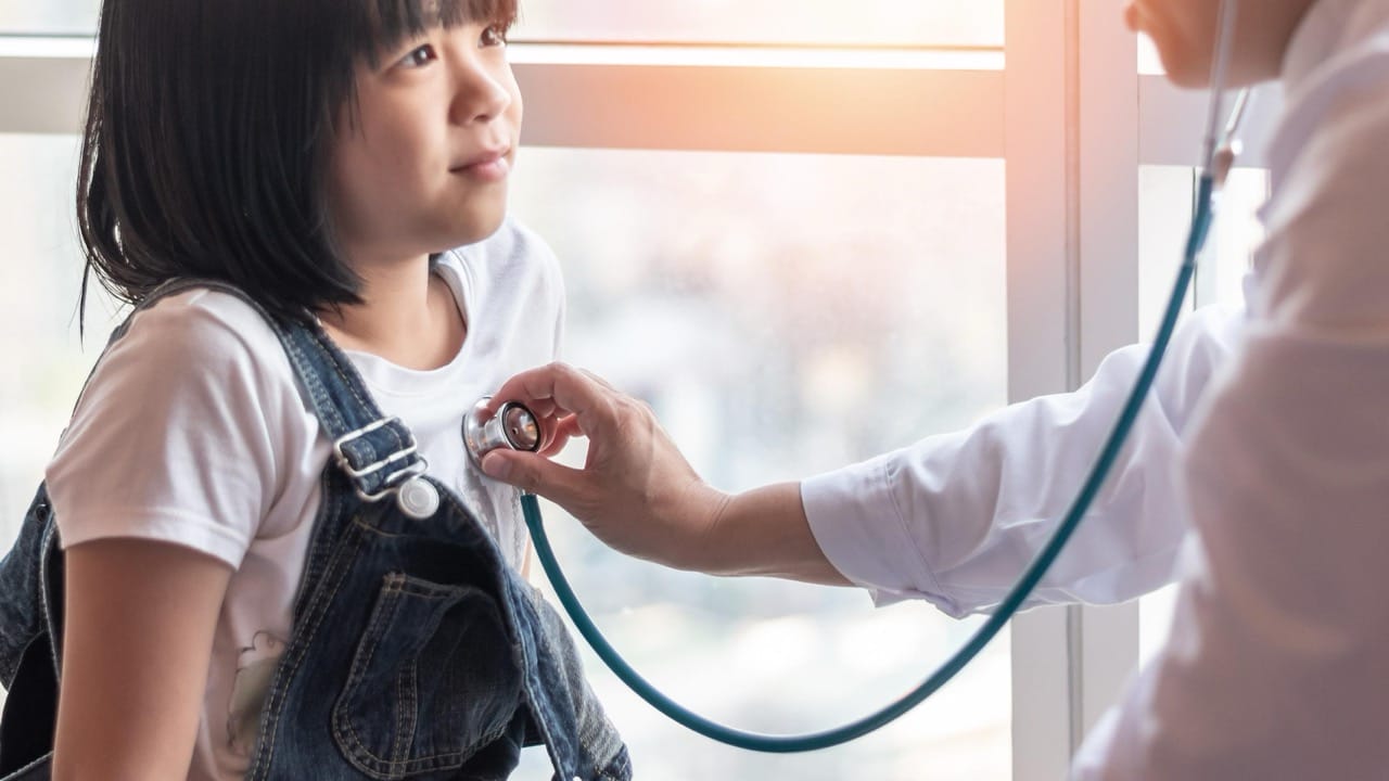 Child receiving allergy and asthma evaluation